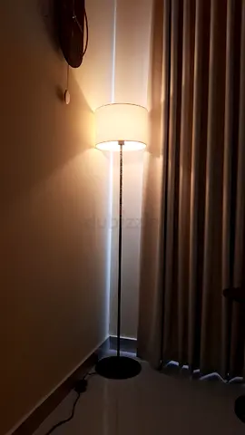 Slim black metal floor lamp with fabric drum shade - good condition