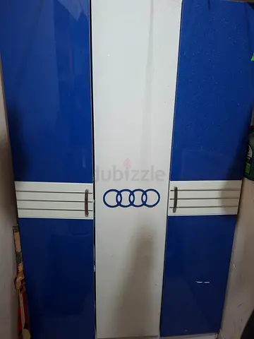 Blue and white 3-door wardrobe in good condition