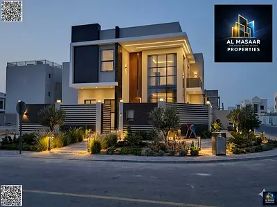 Brand new corner villa, first occupancy, custom finishing, including registration and ownership fees, opposite the Azha project. Features a seating ar