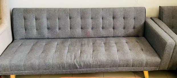 Grey Fabric L- shaped sofa bed  Set with Coffee Table - AED 500 (sofa) / AED 20 (table)  Negotiable