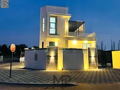 Luxury villa in Al Helio 2 - a distinctive corner on two streets with an elegant design and an unmis