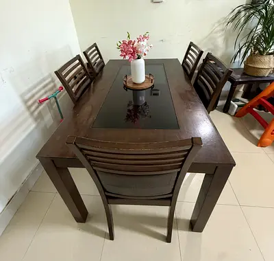 Stylish Brown Dining Table with Glass Top From Home Center