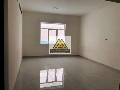 Spacious Apartment for Rent in Al Helio 2 - Master Bedroom with Modern Wardrobe System