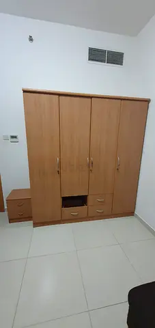 4-Door Wooden Wardrobe with Drawers and Side Nightstand - Good Condition