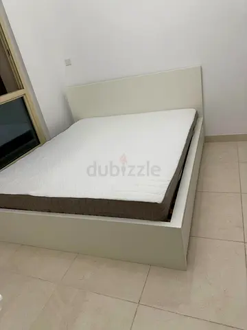 Ikea White platform double bed frame with mattress - simple modern design