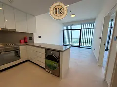 Luxurious 1bhk with balcony American kitchen / new vida buildings in aljada sharjah