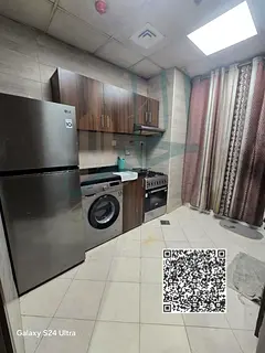 Furnished two-bedroom apartment with a living room for monthly rent in Al Waha Towers – Tower 1 A 