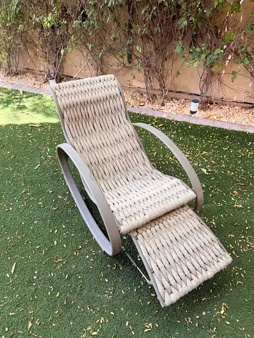 Outdoor Wicker Rocking Lounge Chair with Footrest.
