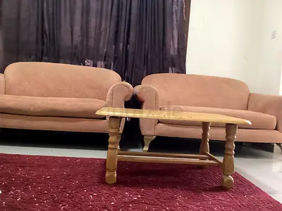 2 couches and 1 small table