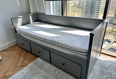 IKEA Hamnes Day bed with 3 storage drawers underneath and with 2 IKEA mattresses