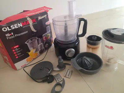 Olsenmark 10-in-1 Food Processor with Multiple Attachments... Twister button needs repairing