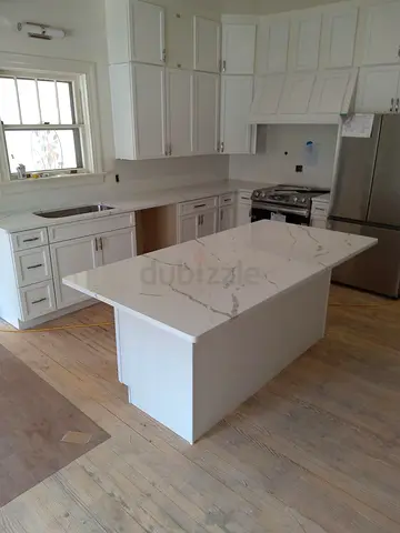 Minimalist Kitchen Island with Natural Wood Top and Drawer Storage