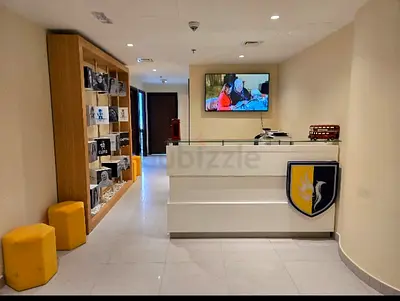 Modern White Reception Desk with Display Shelving