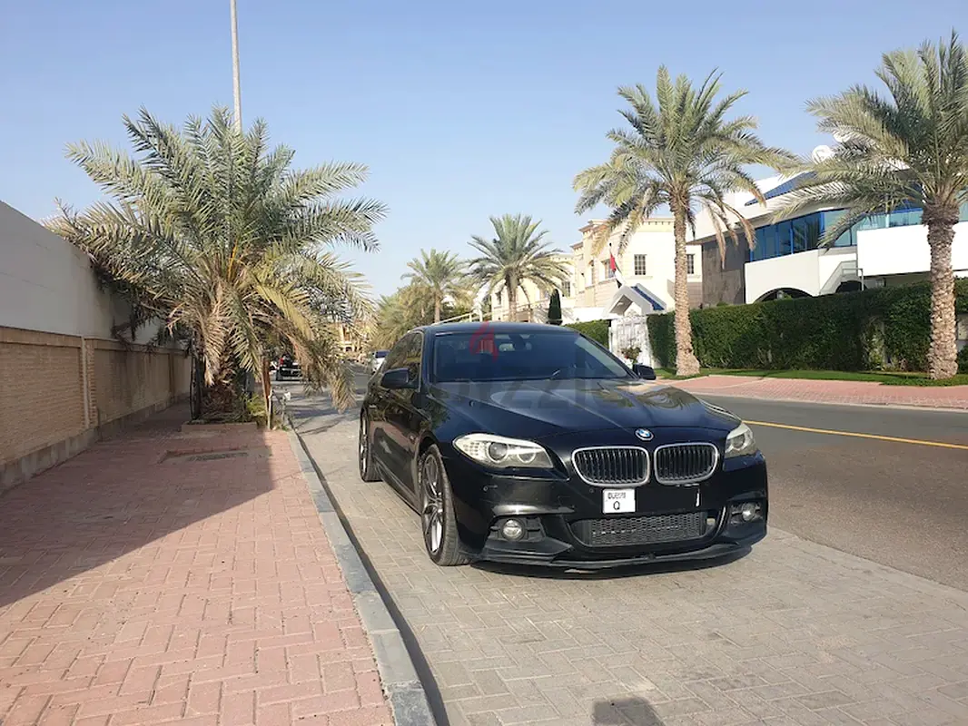 BMW 5-Series 2011 — photo 1 of 13