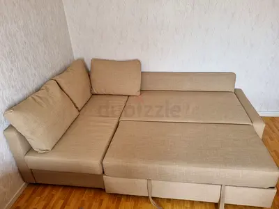 Beige L-shaped Sofa Bed with Storage — Good Condition