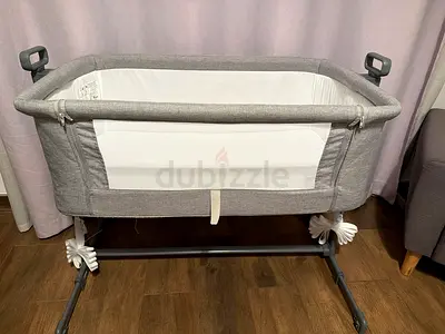 Grey bedside bassinet / cradle - excellent condition hardly  used juniors