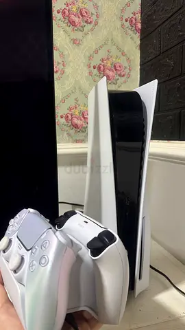 PS5 Disk version UAE  comes with gaming monitor and 2 controller  stand + charging dock