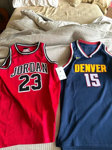 Two NEW with Tag basketball jerseys (ORIGINALLY 500 EACH) - Jordan 23 (red) and Denver 15 (blue)
