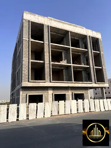 Building for sale in Al Naseem, Sharjah | Commercial showroom + 12 apartments | Electricity and wat