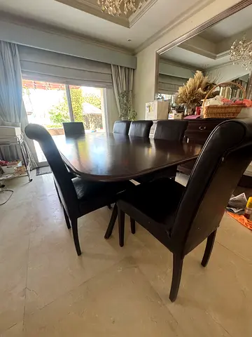 Solid Dark Wood Dining Table with 8 Upholstered Chairs - Good Condition