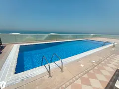 Luxury two-bedroom apartment for rent in Al Qulaya, Sharjah. Features include two bathrooms, central