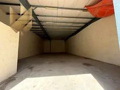 Warehouse for rent in Industrial Area 18, Sharjah, with an area of 3,500 sq. ft., equipped with a fi