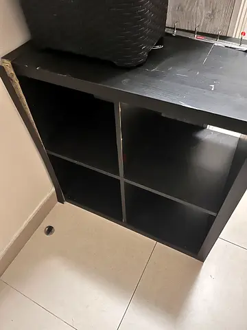1 Storage shelf from  Ikea, 1 Black 4-Cube Storage Shelf Ikea and one chair ikea