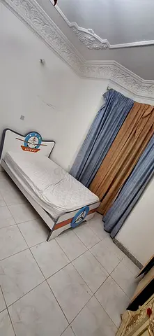 Fully furnished sharing room  with spacious  washroom . All utilities  included  with free parking