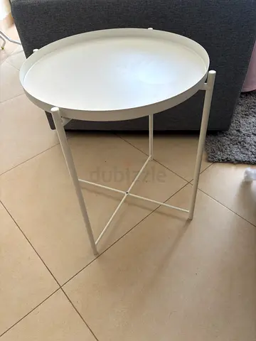 Small round white side table with removable tray