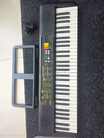 My Yamaha PSR‑F52 61‑key digital keyboard — used, works well