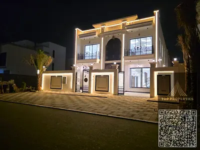 Villa in a prime location, 5 master bedrooms, master majlis, master living room, complete main suite, maid's room, fully equipped, and a lounge on the