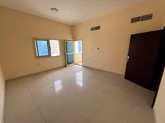 A three-bedroom apartment with a living room is available for annual rent in Al Nuaimiya 1