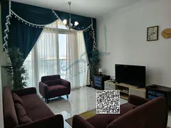 Furnished two-bedroom apartment with a living room for monthly rent in Al Waha Towers – Tower 2 A 
