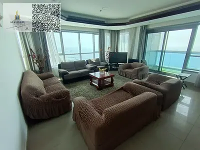 Furnished apartment for annual rent in Ajman, Corniche Tower, two bedrooms and a living room, master bedrooms, spacious