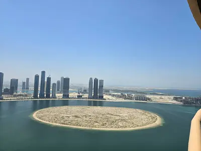 Three-bedroom apartment with balcony in Al Khan, free AC and parking, sea view, gym, pool and built-in wardrobes included.