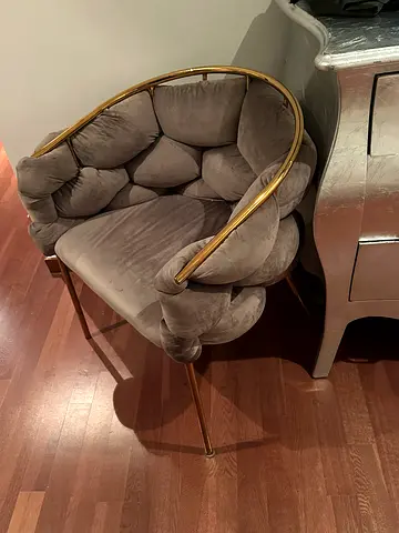 Grey velvet accent chair with gold frame