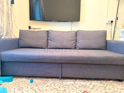 IKEA 3-Seater Grey Fabric Sofa Bed with hidden storage in Good Condition