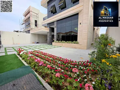 Fully smart villa with a modern facade and elegant design, including water, electricity, and air conditioning.