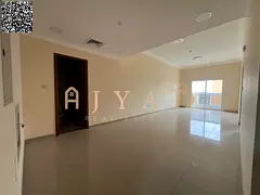 1BR first-tenant apartment for annual rent in Al Jurf 3. Master room, 2 baths, balcony, central AC,