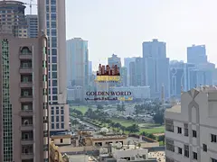 English: 2BR Apartment with Balcony, Open Panorama View &amp; Free Parking – AED 50K