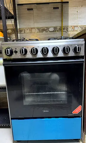 Midea Cooker 60 cm 4-burner gas stove with oven - New Condition