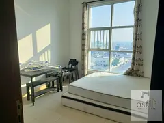 Two-bedroom apartment with a living room in City Towers with parking at the lowest price in Ajman