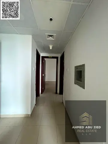 Beautiful 2BR apartment, separate hall, 2 baths, closed kitchen, central AC, balcony open view, excellent finish, prime location, easy access to Dubai