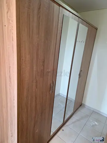 Built-in wooden wardrobe / closet shelving unit - good condition