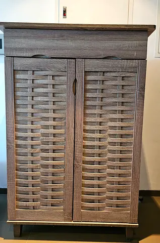 Compact wooden storage cabinet with louvered doors