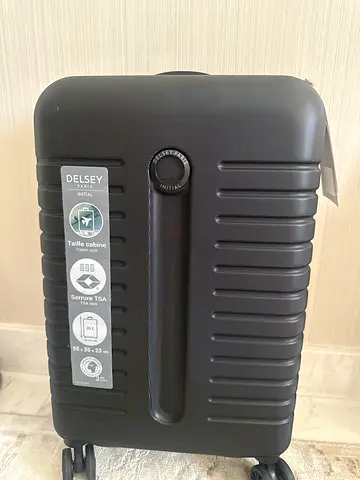 Delsey hard shell carry-on suitcase with spinner wheels (black)