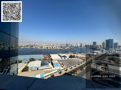 Largest stylish 2BR apartment, hall, 2 baths, balcony sea view, central AC, excellent finish, prime location, easy access to Dubai & Sharjah