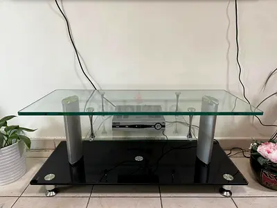 Glass TV Stand with Black Base and Metal Supports - Good Condition