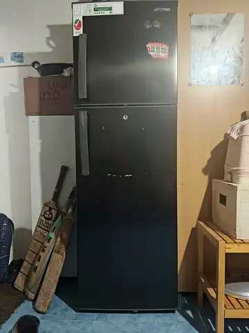 Black Top-Freezer Refrigerator - Good Working Condition