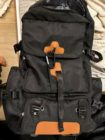 Black Canvas Backpack with wheels Multiple Pockets and Leather Trim
